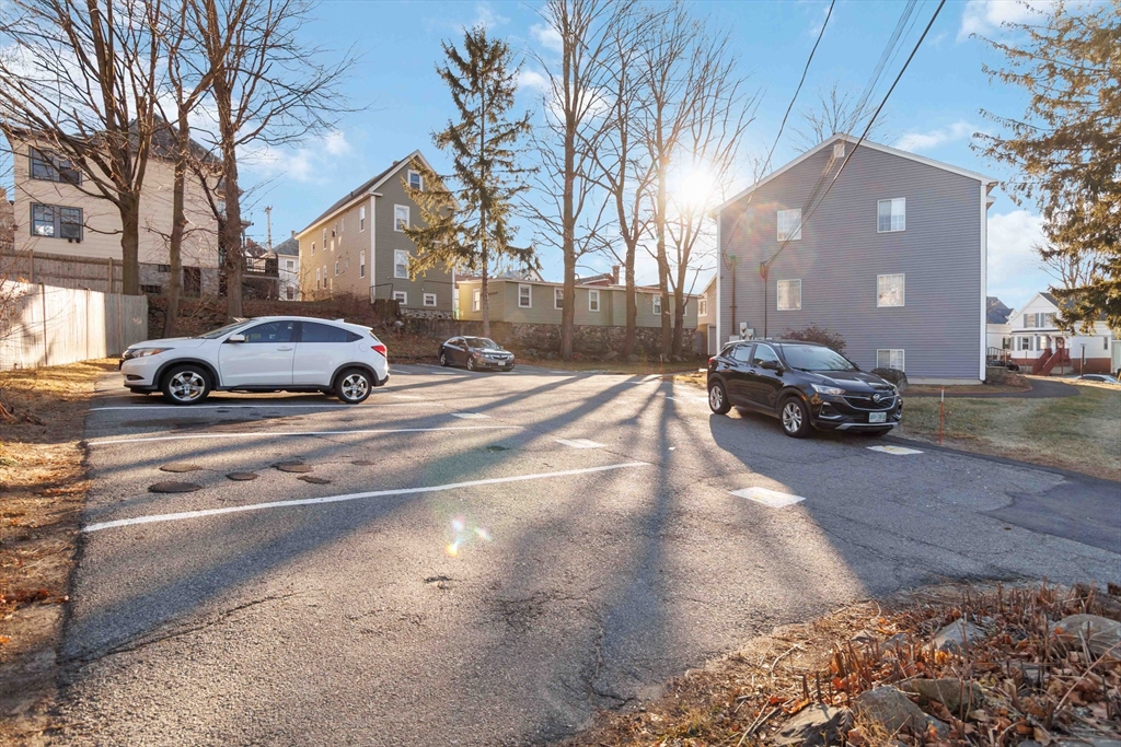 1 19th Street, Unit 3 Lowell, MA 01850 - Photo 22 of 22 a car parked in front of a building
