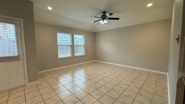 a bedroom with a bed and a shower