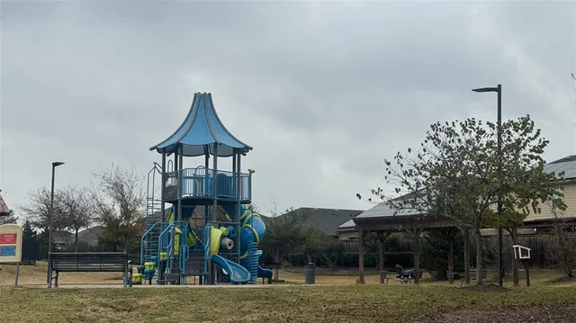 a view of a park with trees