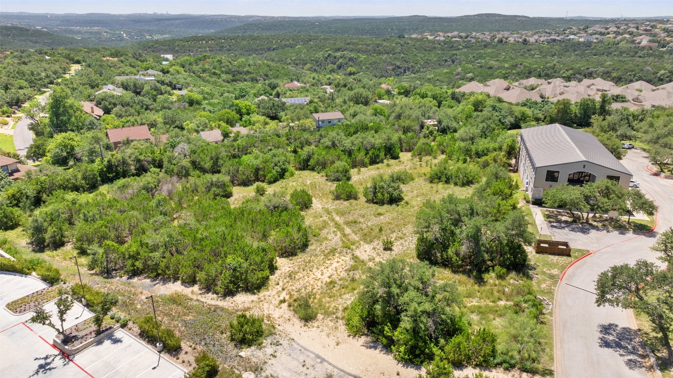 8 Lakeway Centre Court Lakeway, TX 78734 - Photo 5 of 9 an aerial view of residential houses with outdoor space and trees