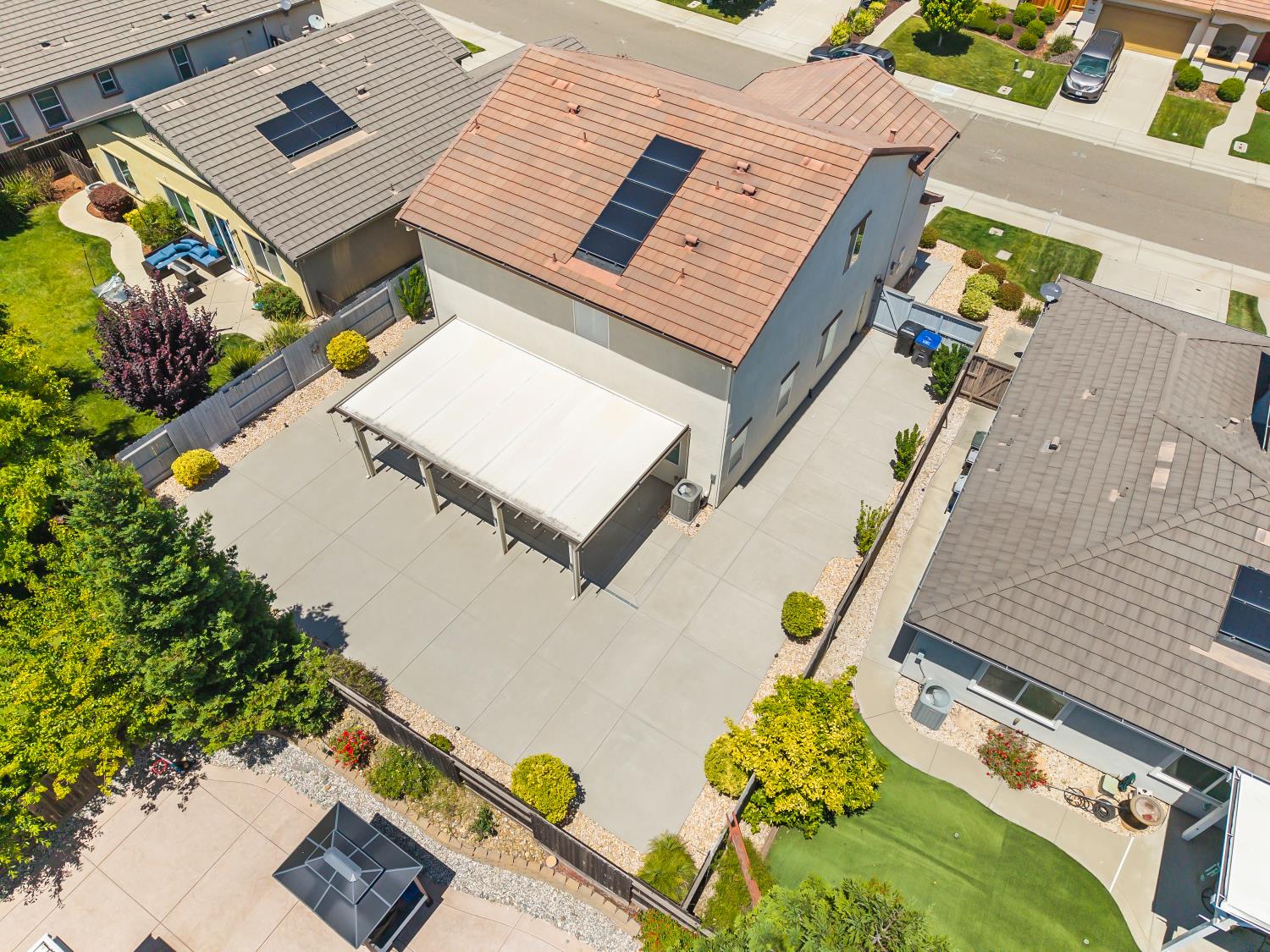 5453 Mossy Stone Way Rancho Cordova, CA 95742 - Photo 72 of 81 an aerial view of a house with a swimming pool and outdoor seating