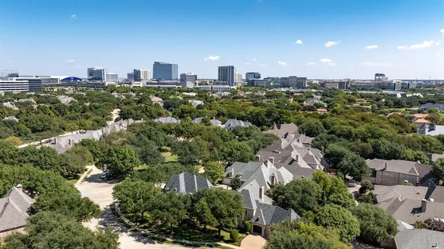 an aerial view of a city with lots of residential buildings