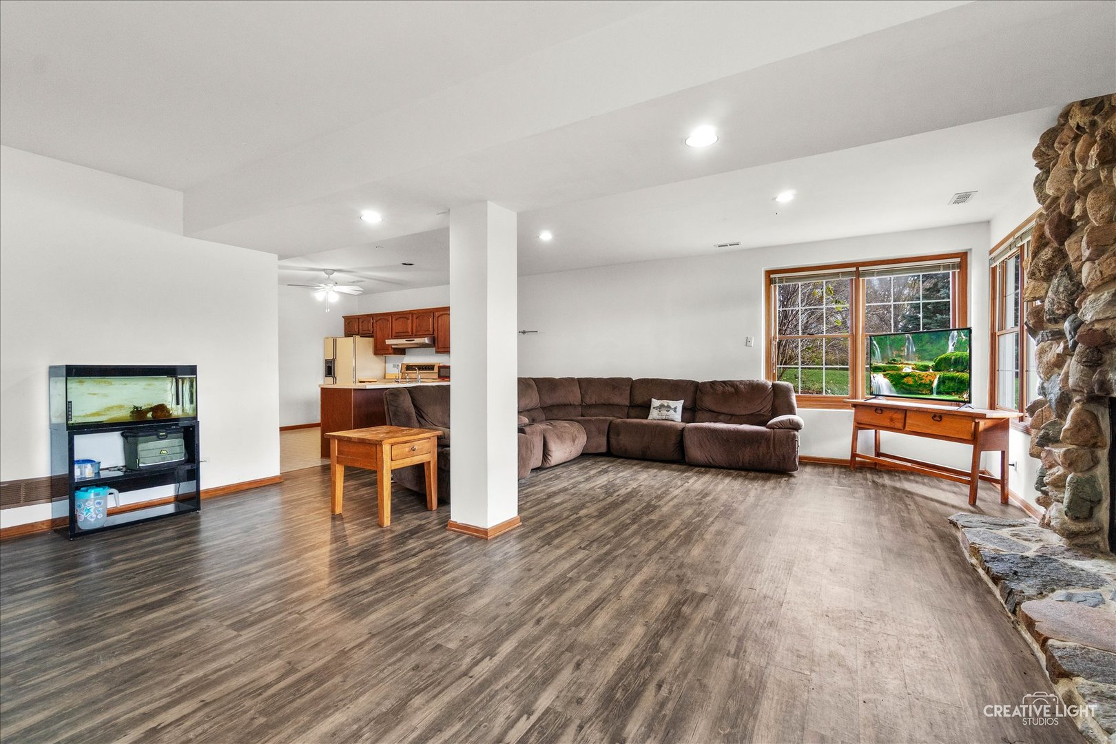 675 White Pine Circle Lake In The Hills, IL 60156 - Photo 21 of 41 a living room with furniture and a large window