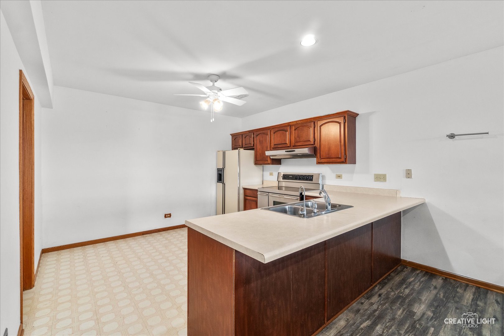 675 White Pine Circle Lake In The Hills, IL 60156 - Photo 23 of 41 a kitchen with a sink cabinets and appliances