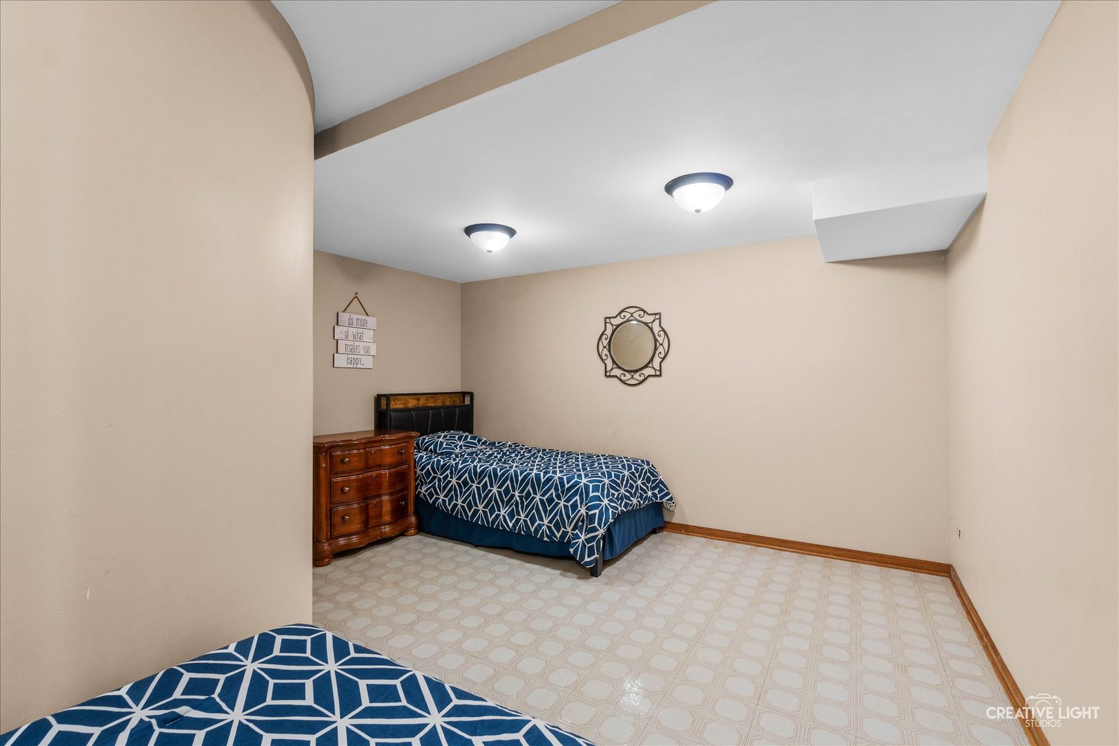 675 White Pine Circle Lake In The Hills, IL 60156 - Photo 26 of 41 a bedroom with a bed and a table in it