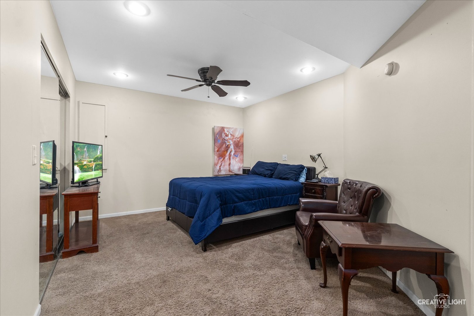 675 White Pine Circle Lake In The Hills, IL 60156 - Photo 28 of 41 a living room with furniture and a window
