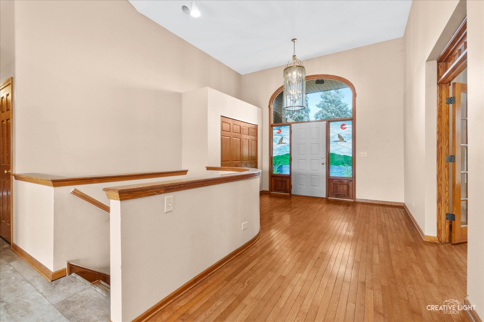 675 White Pine Circle Lake In The Hills, IL 60156 - Photo 4 of 41 wooden floor in an empty room with a window