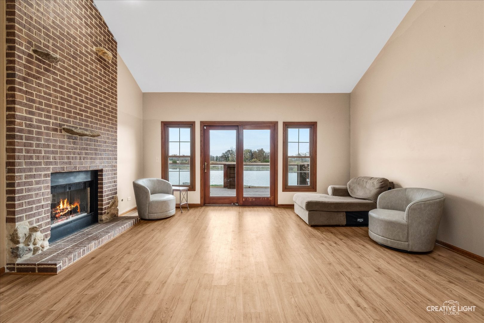 675 White Pine Circle Lake In The Hills, IL 60156 - Photo 6 of 41 a living room with furniture and a fireplace