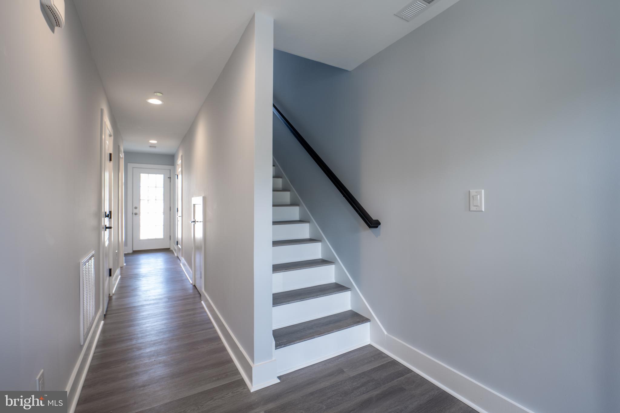 9823 Golf Course Road, Unit 25 Ocean City, MD 21842 - Photo 11 of 44 Hall and steps to 2nd floor