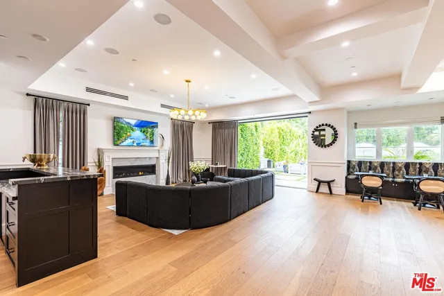 a kitchen with a sink stove and window