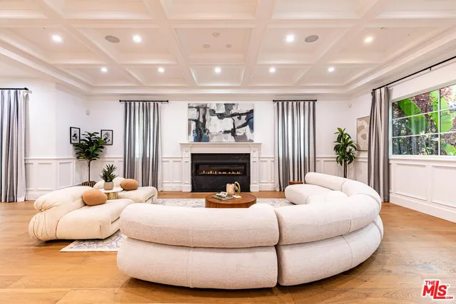a kitchen with a sink cabinets and window