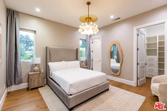 a view of a patio with chairs and a table