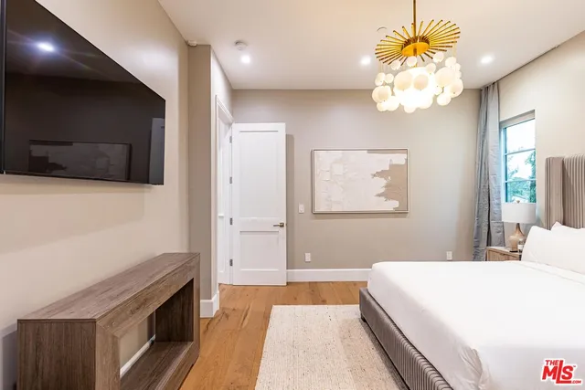 a view of a chairs and table in the patio