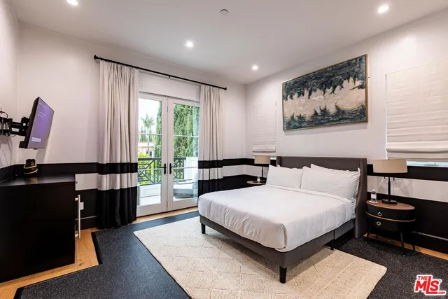 an aerial view of residential building with green space