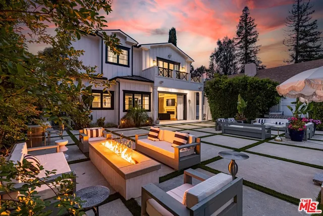 a view of swimming pool with chairs