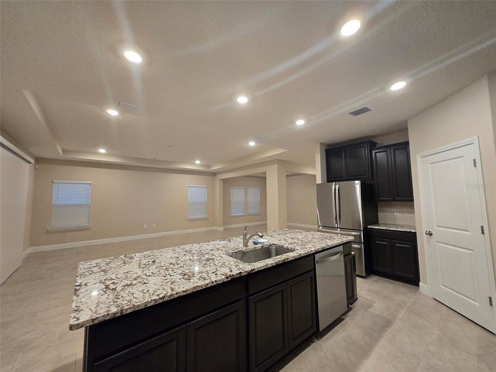 6008 Southwest 46th Drive Gainesville, FL 32608 - Photo 14 of 56 a bathroom with a sink and a mirror