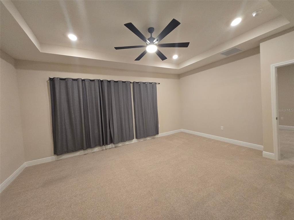 6008 Southwest 46th Drive Gainesville, FL 32608 - Photo 17 of 56 an empty room with ceiling fan