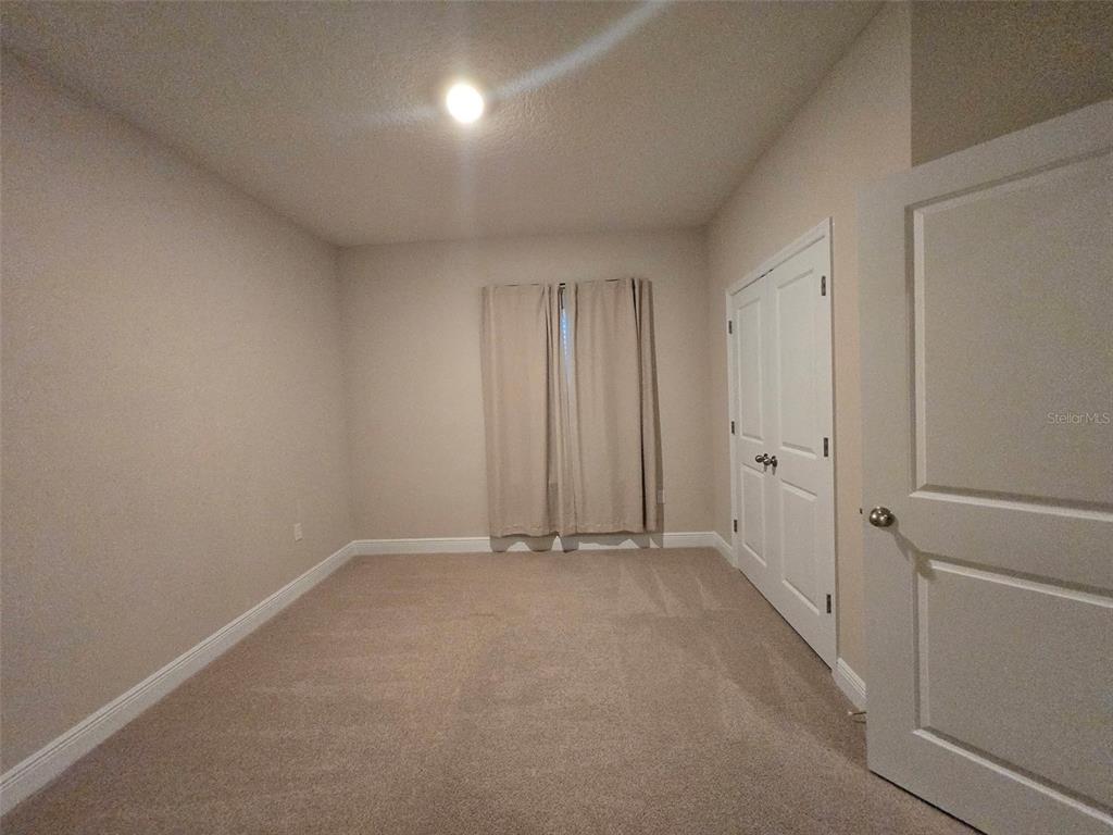 6008 Southwest 46th Drive Gainesville, FL 32608 - Photo 32 of 56 a view of an empty room