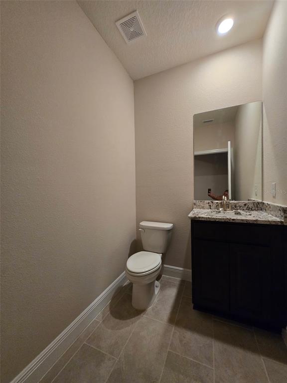 6008 Southwest 46th Drive Gainesville, FL 32608 - Photo 33 of 56 a bathroom with a sink and a toilet