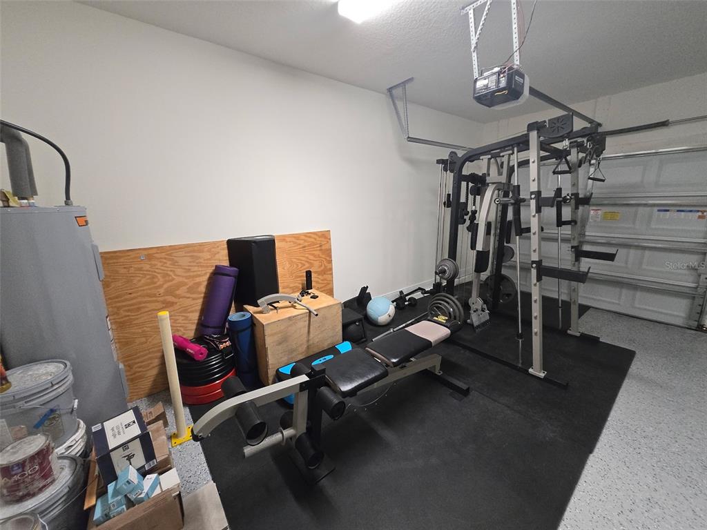6008 Southwest 46th Drive Gainesville, FL 32608 - Photo 47 of 56 a view of a room with gym equipment