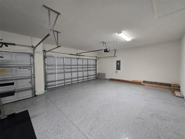 a view of a house with backyard and porch