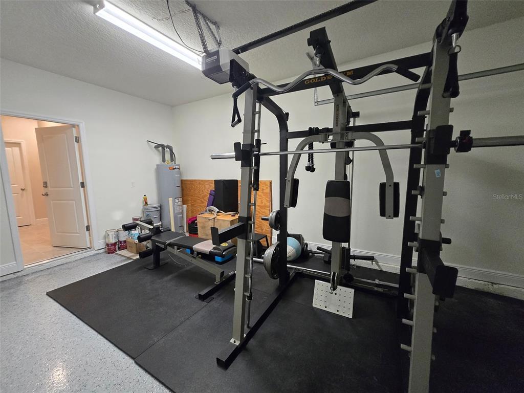 6008 Southwest 46th Drive Gainesville, FL 32608 - Photo 51 of 56 a view of a room with gym equipment