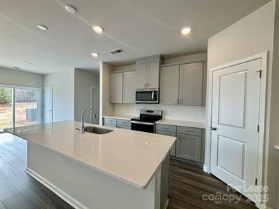 5273 Brailey Circle Kannapolis, NC 28081 - Photo 8 of 27 a kitchen with sink cabinets and refrigerator