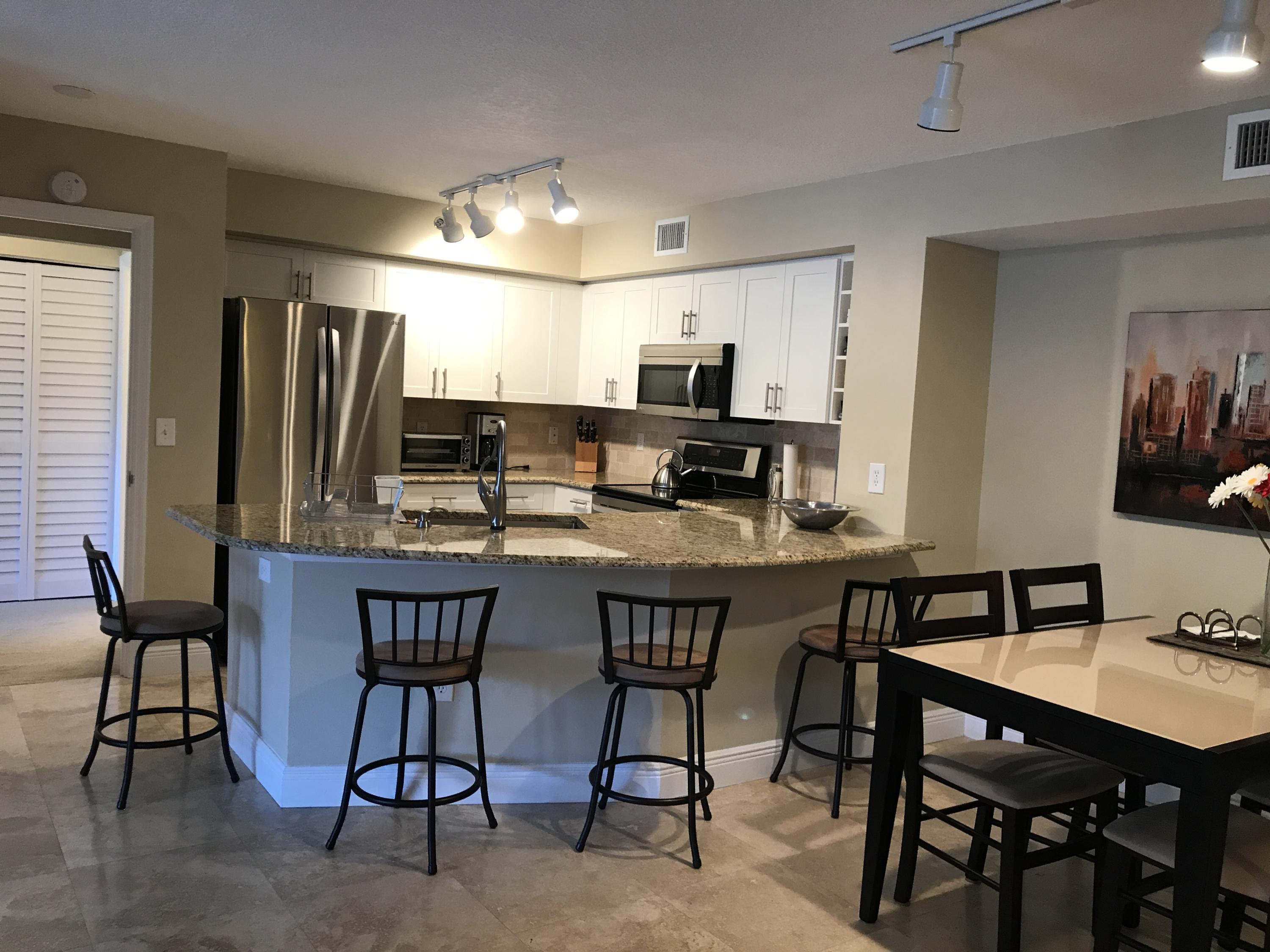 3131 Clint Moore Road, Unit 103 Boca Raton, FL 33496 - Photo 5 of 41 kitchen