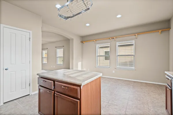 a view of a kitchen cabinets and wooden floor