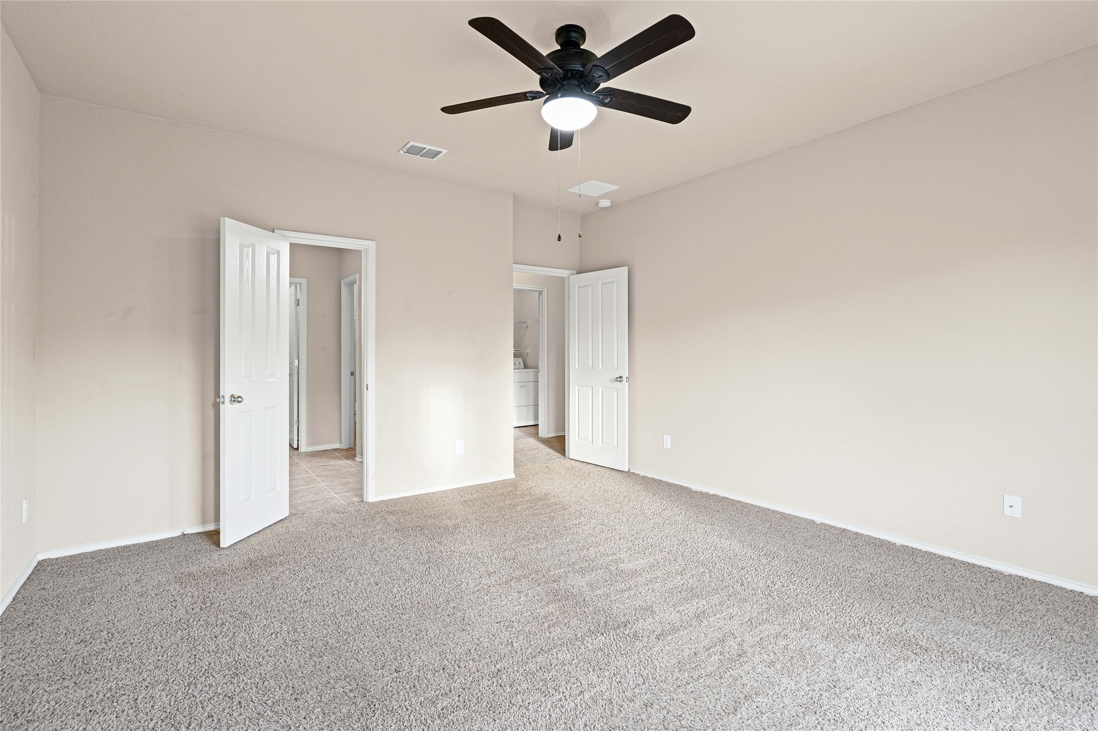 11741 Easy Street Austin, TX 78748 - Photo 16 of 27 a view of a big room with a ceiling fan and a window