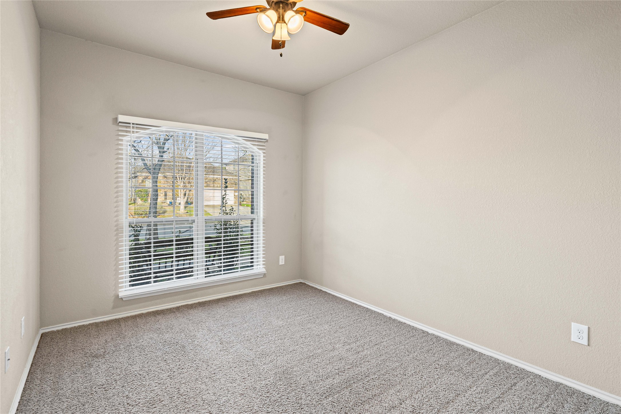 11741 Easy Street Austin, TX 78748 - Photo 19 of 27 an empty room with chandelier fan