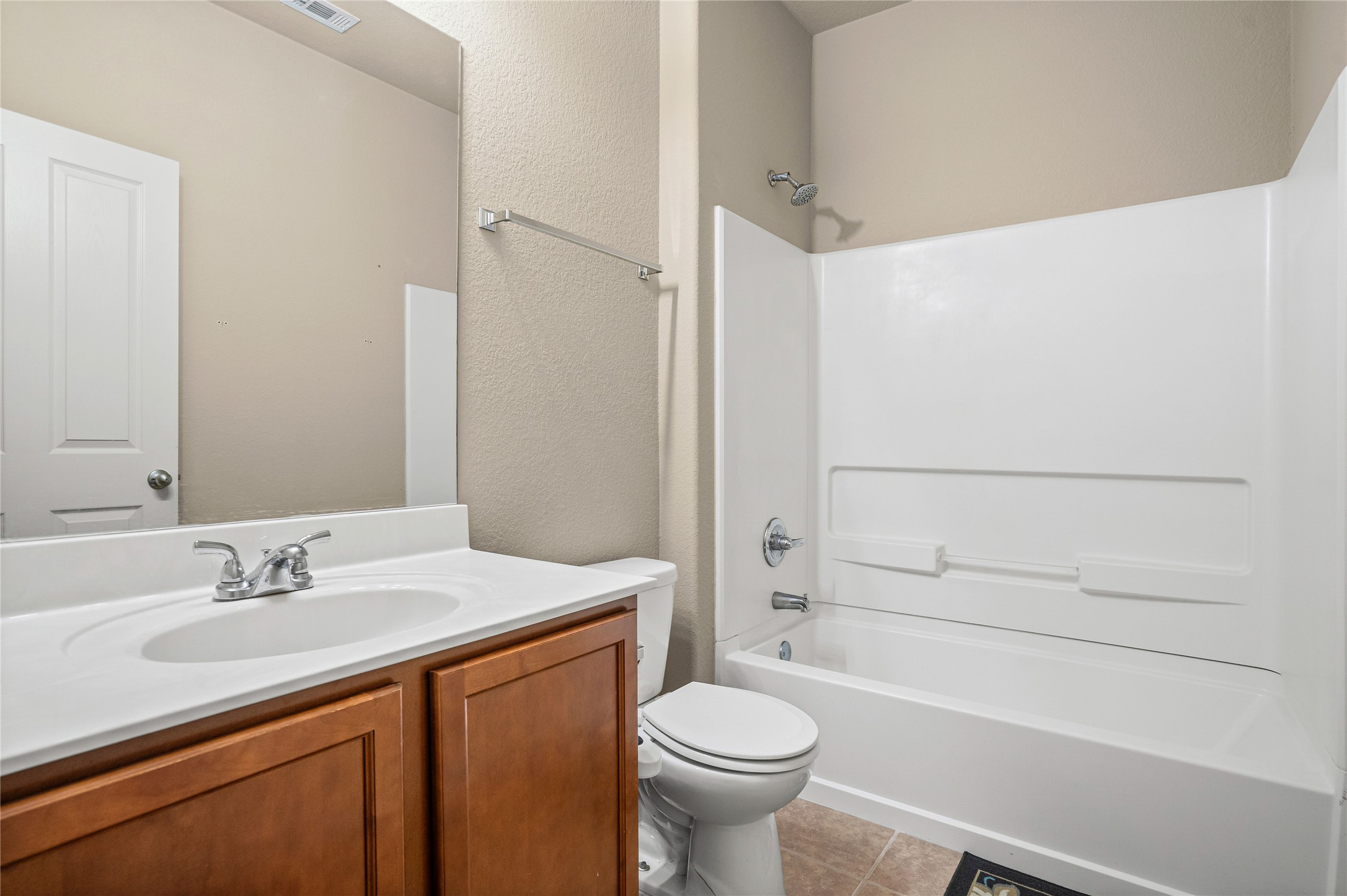 11741 Easy Street Austin, TX 78748 - Photo 21 of 27 a bathroom with a sink a toilet and shower