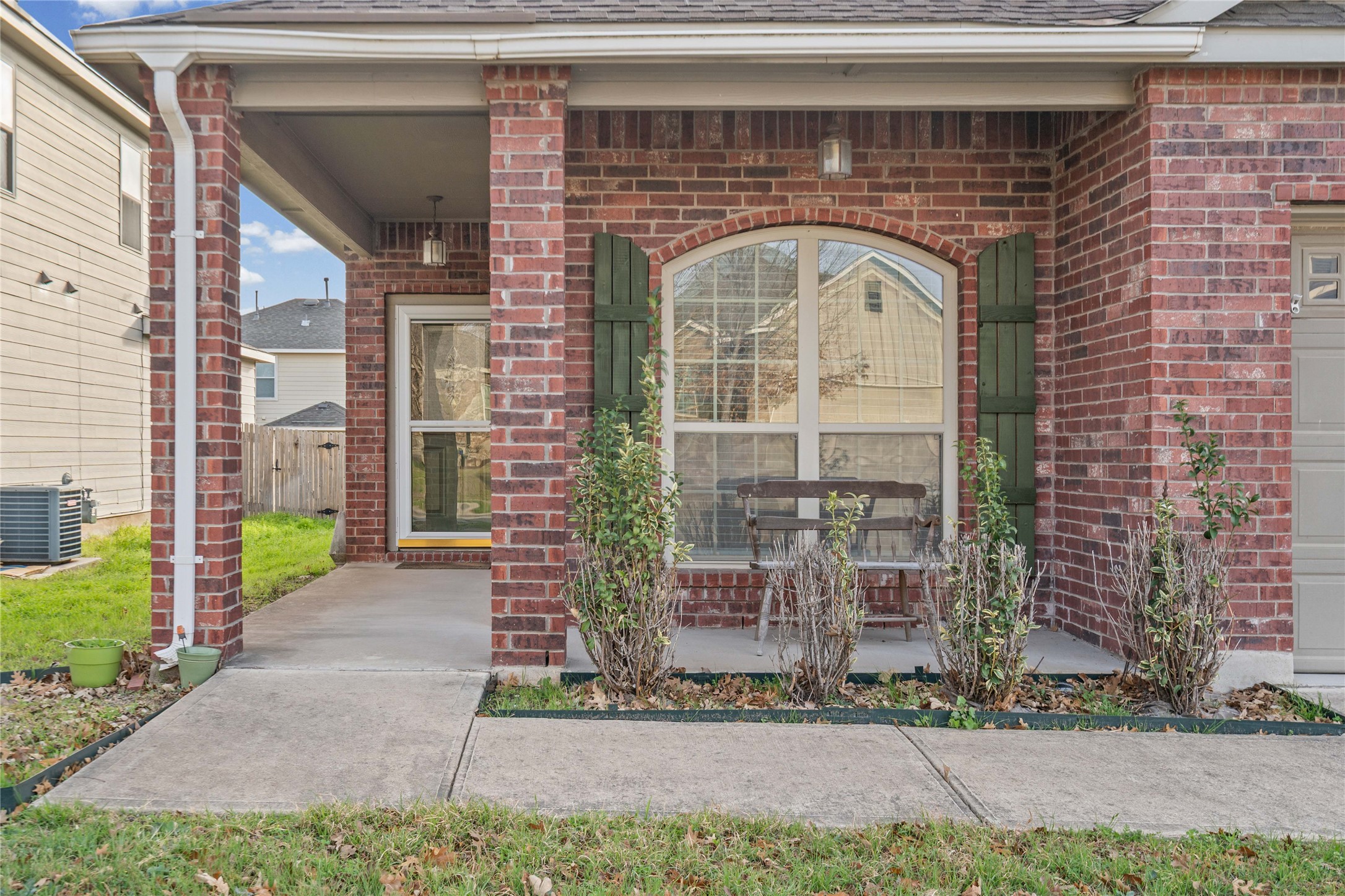 11741 Easy Street Austin, TX 78748 - Photo 4 of 27 a front view of a house with garden