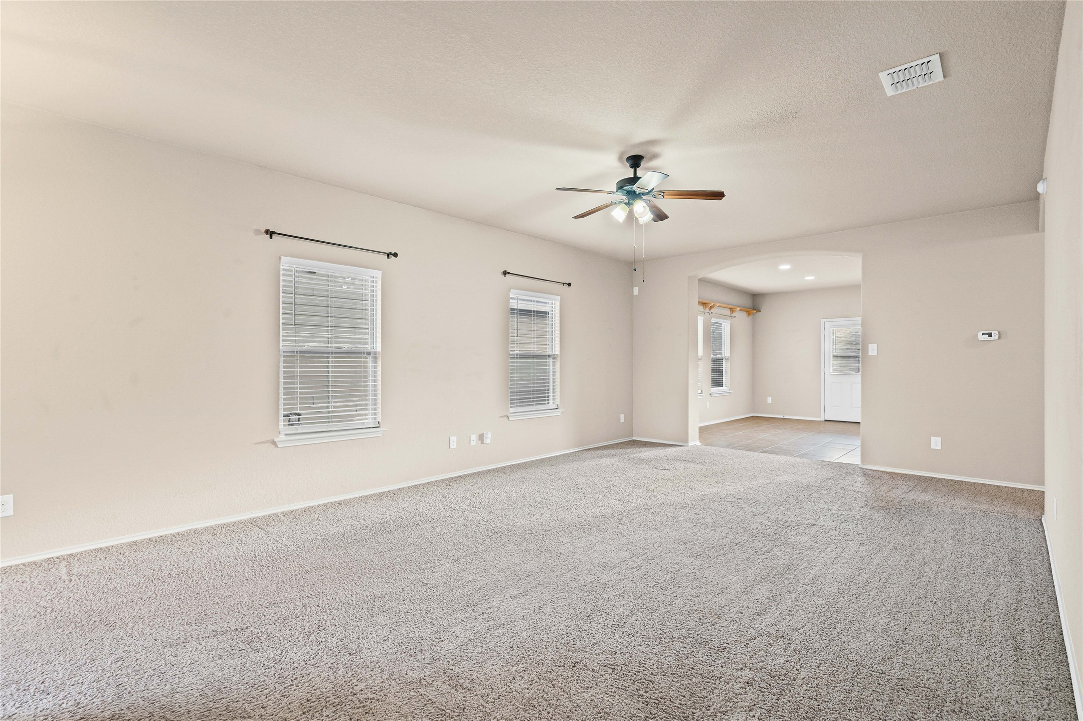 11741 Easy Street Austin, TX 78748 - Photo 6 of 27 a view of an empty room with a window