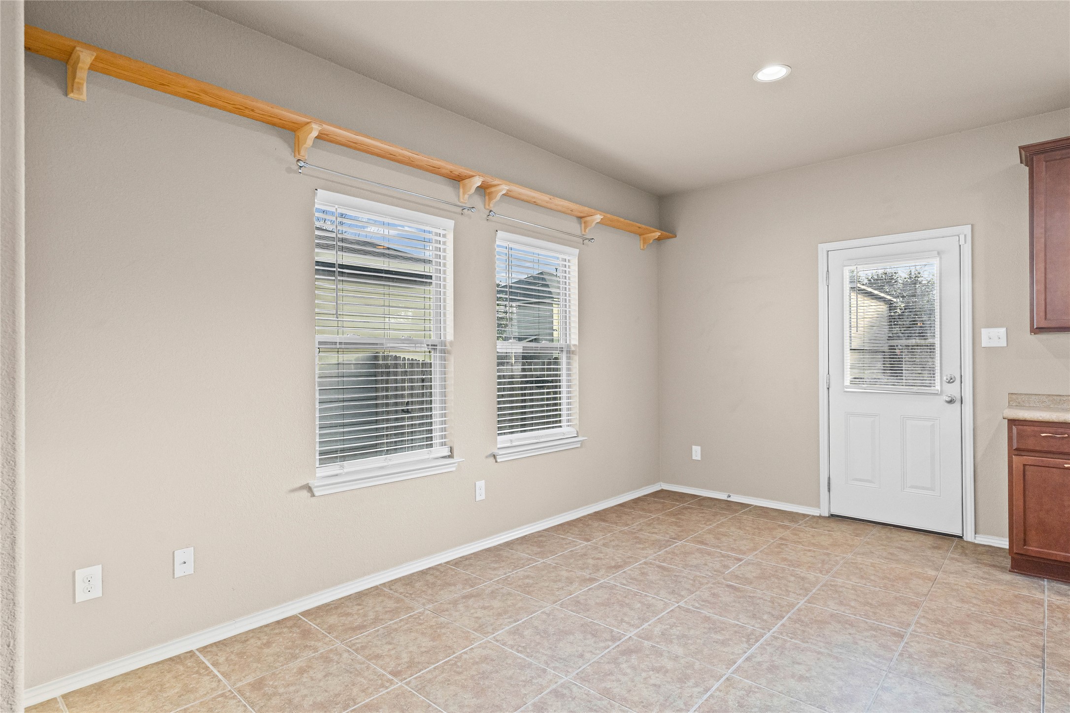 11741 Easy Street Austin, TX 78748 - Photo 9 of 27 a view of an empty room with a window