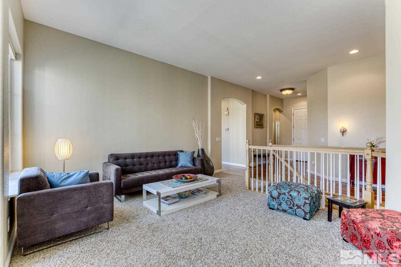 3755 Bridge Creek Court Reno, NV 89519 - Photo 16 of 40 a living room with furniture and a couch