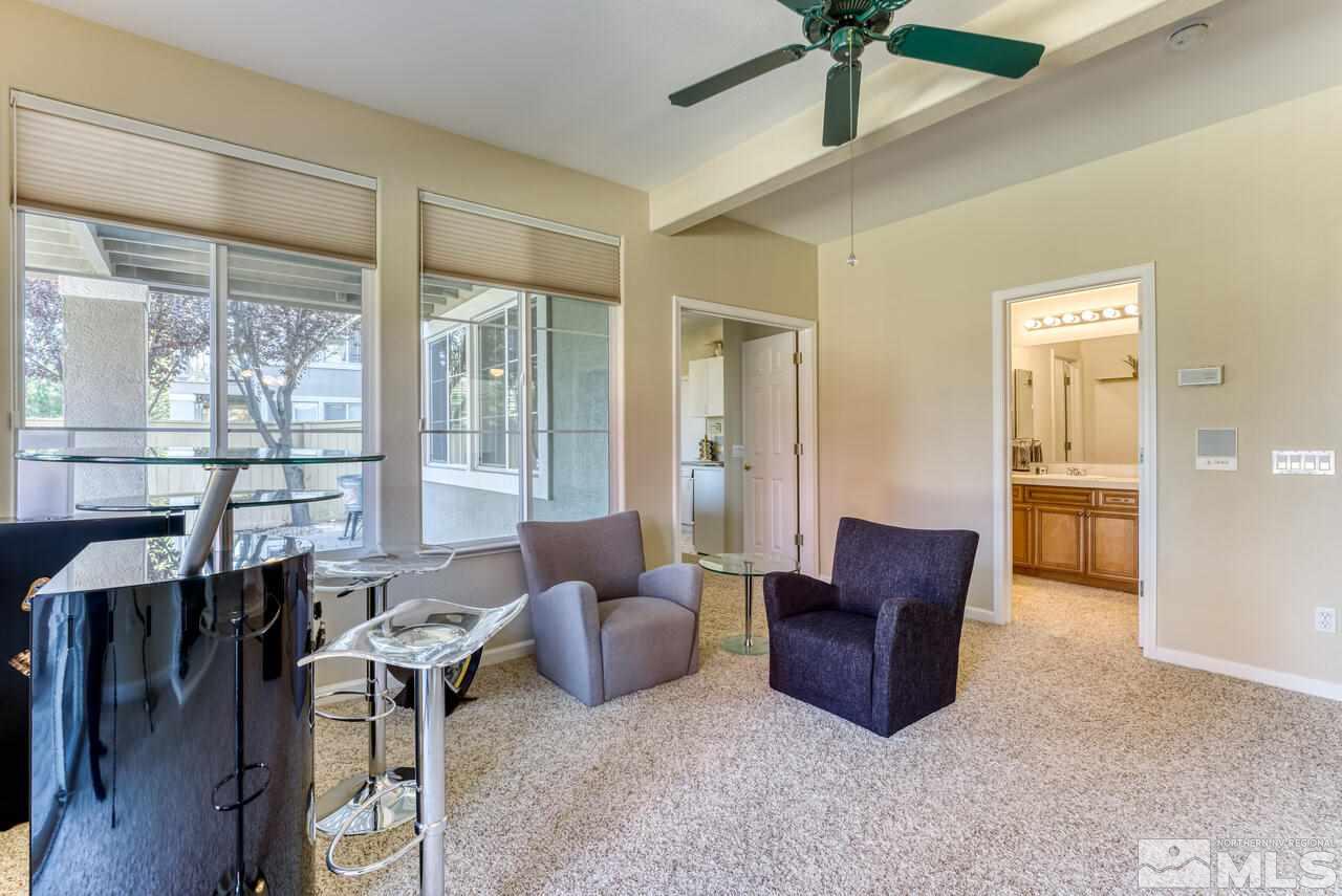 3755 Bridge Creek Court Reno, NV 89519 - Photo 26 of 40 a living room with furniture and a window