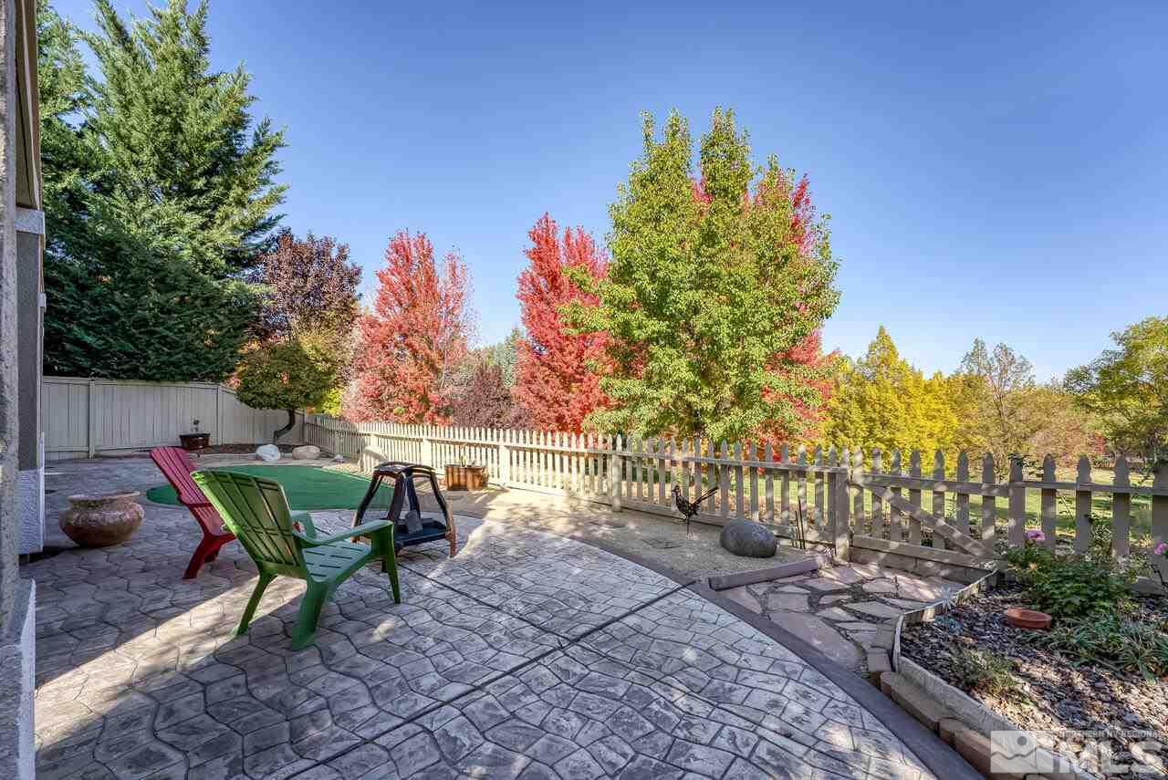 3755 Bridge Creek Court Reno, NV 89519 - Photo 35 of 40 a view of a chairs and table in the patio