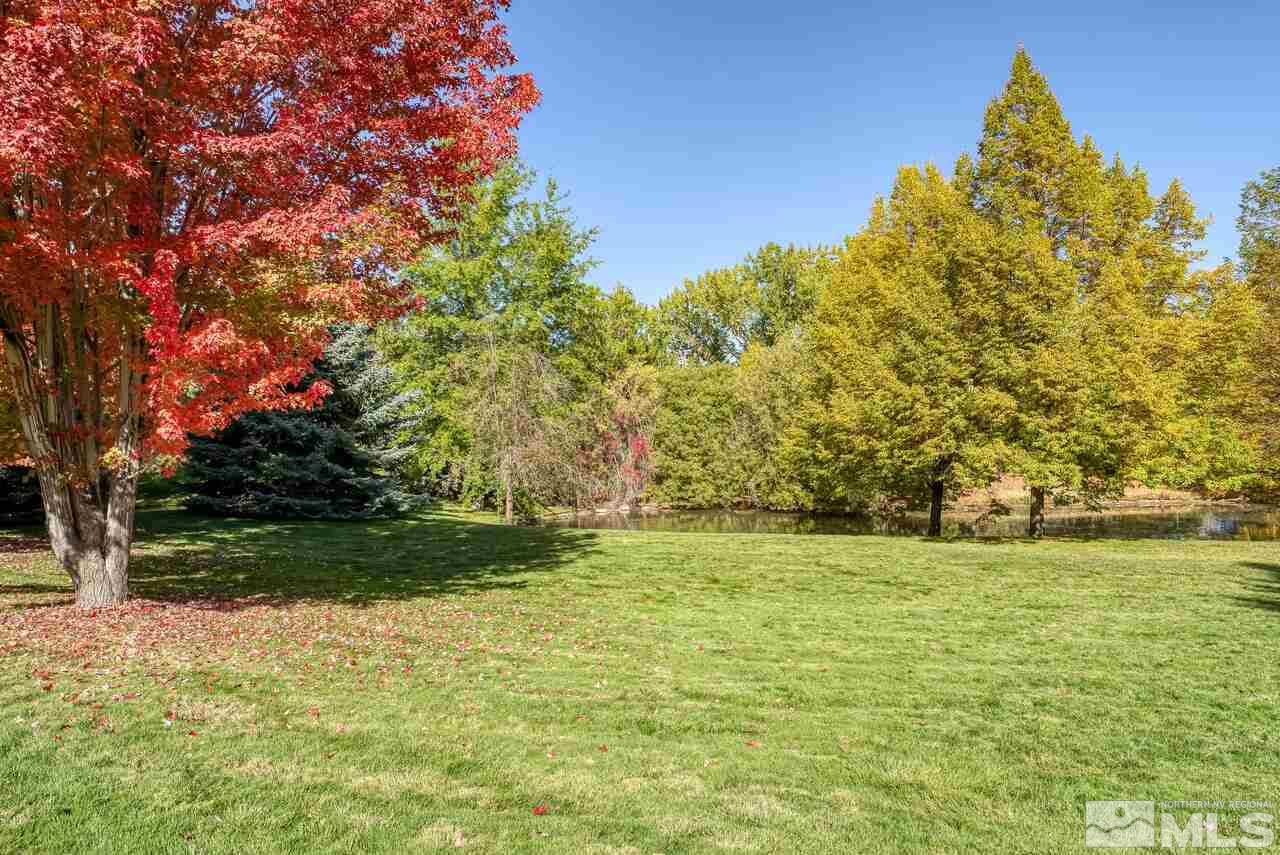 3755 Bridge Creek Court Reno, NV 89519 - Photo 38 of 40 a view of a field with trees in the background