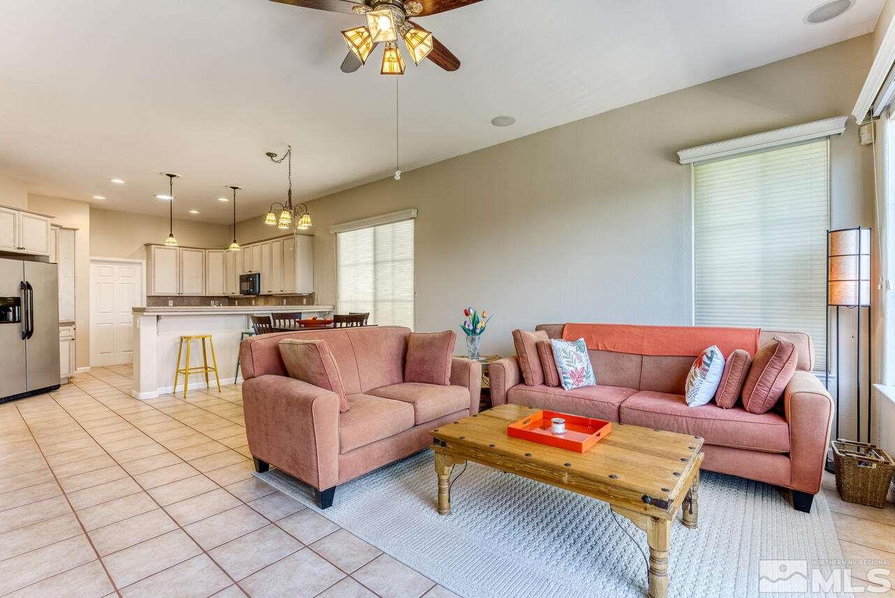 3755 Bridge Creek Court Reno, NV 89519 - Photo 9 of 40 a living room with furniture and kitchen view