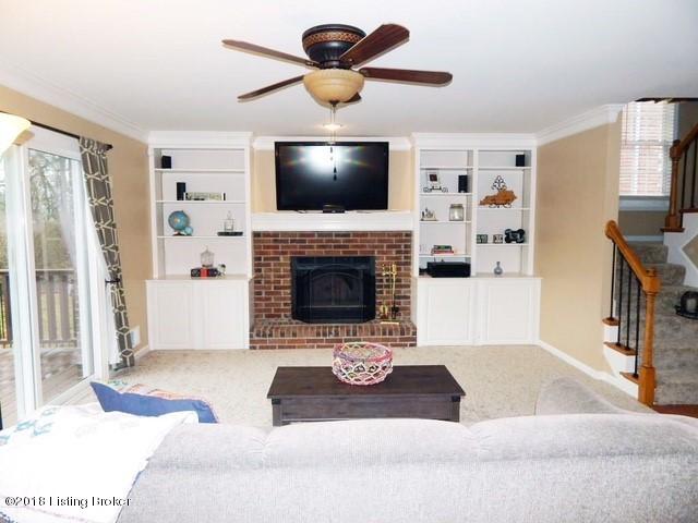 1408 Autumn Ridge Road Louisville, KY 40242 - Photo 8 of 36 Built in shelving and gas started fireplace.
