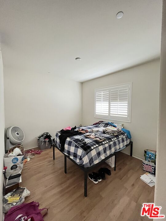 11785 Connell Road Riverside, CA 92505 - Photo 12 of 39 a bedroom with bed and a window
