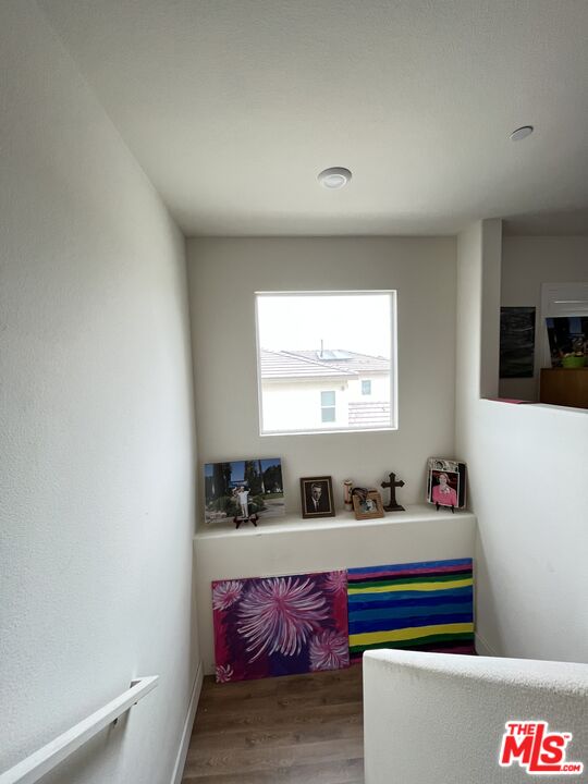 11785 Connell Road Riverside, CA 92505 - Photo 13 of 39 a living room with kitchen island furniture and a window
