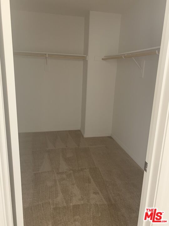 11785 Connell Road Riverside, CA 92505 - Photo 20 of 39 a view of an empty walk in closet