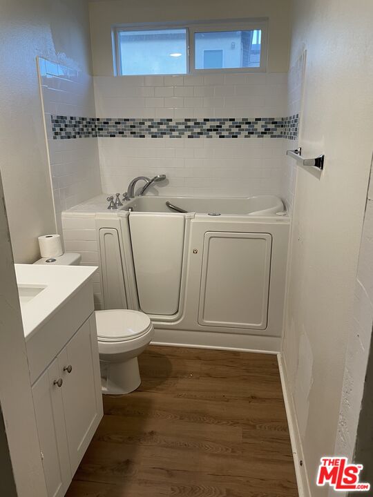 11785 Connell Road Riverside, CA 92505 - Photo 26 of 39 a bathroom with a toilet and a sink