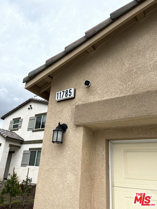 11785 Connell Road Riverside, CA 92505 - Photo 34 of 39 a close up of a street sign