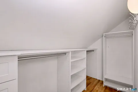 a view of an empty walk in closet