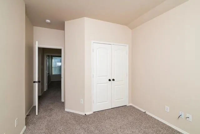an empty room with closet