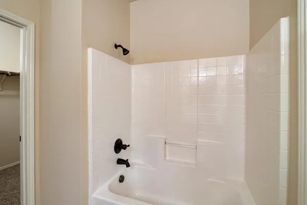 a bathroom with a bathtub