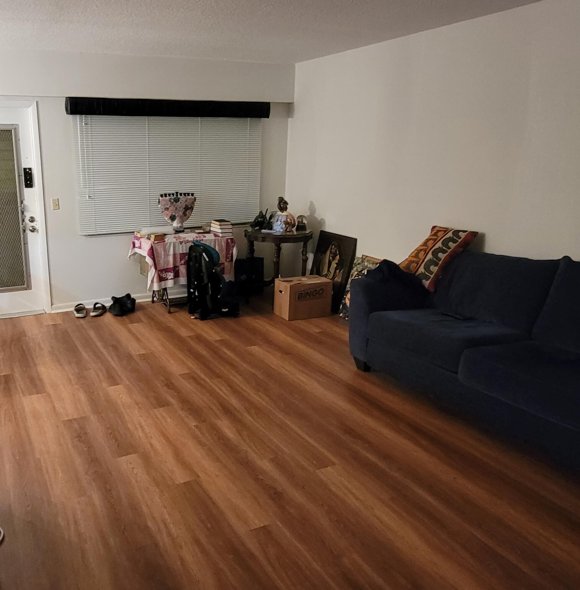 326 Fanshaw Drive, Unit H Boca Raton, FL 33434 - Photo 2 of 10 a living room with furniture